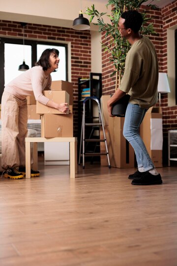 diverse-people-buying-first-apartment-moving-together-unpacking-plant-furniture-decorate-household-enjoying-property-relocation-with-decor-start-new-lifestyle-beginnings_482257-49151
