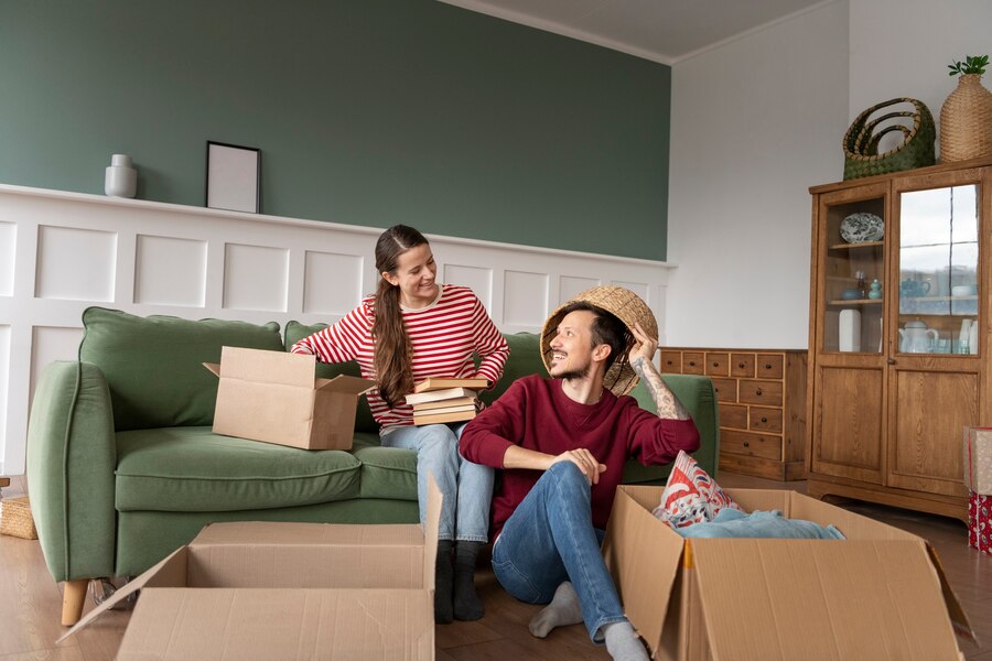 young-family-moving-into-new-home_23-2149199109